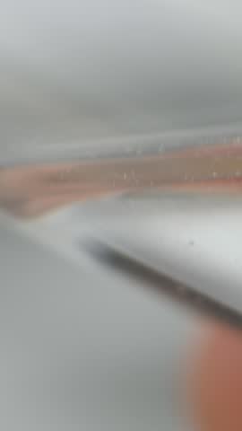 Clear bottle filled with medical substances that mixed together to make medicine. Medicine is meant to be given out in healthcare settings by healthcare workers. New type of medicine and treatment