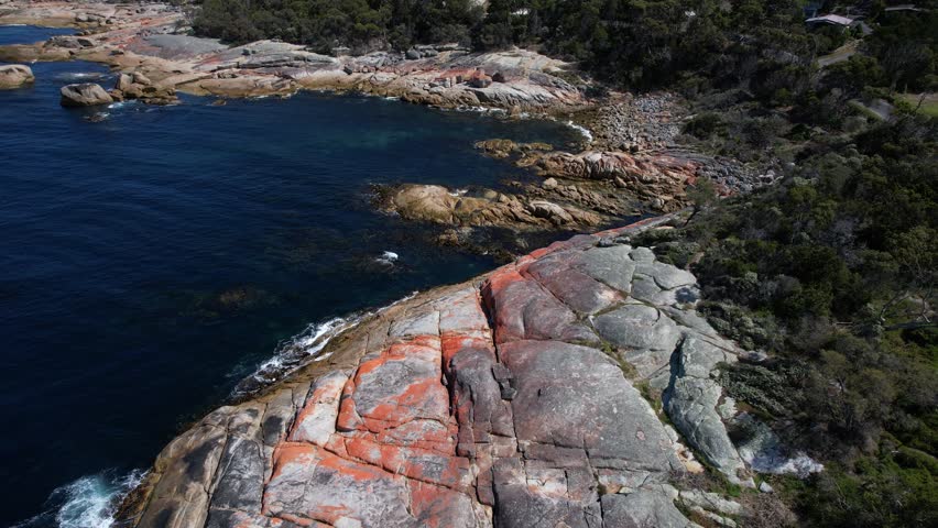Rocky Coastline Near Bicheno Blowhole In Tasmania, Australia - Drone Shot