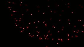 A bright firework explodes in the night sky, scattering sparks and vivid light trails. The scene captures the dynamic glow and dramatic visual effects of the fireworks display. - Powered by Shutterstock - Get 15% off with code: PIKWIZARD15