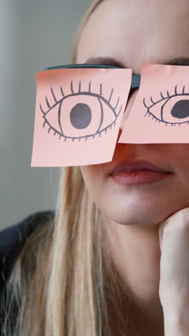 Tired Caucasian business woman pretending working laptop with sticky notes with drawing eyes on glasses businesswoman nap sleepy female girl pretend work in office sleeping falling unmotivated manager