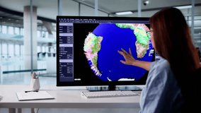 Global Climate Scientist Woman Analyzing Weather Map For Hurricane Forecast - Powered by Shutterstock - Get 15% off with code: PIKWIZARD15