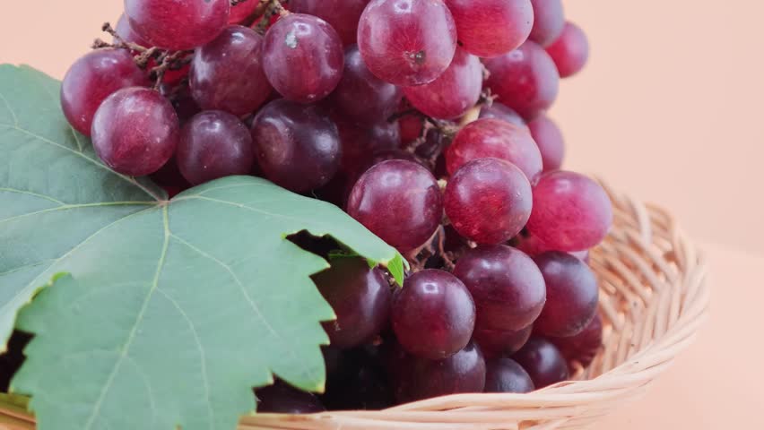 Red grapes on a rotating plate