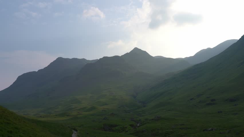 Dramatic silhouetted mountains in the Lake District National Park, UK