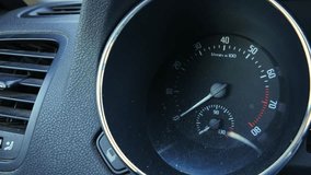 car dashboard instrument cluster showing multiple illuminated warning lights, speedometer needle at idle, fuel and temperature gauges visible, amber and red icons for engine and battery alerts, tense - Powered by Shutterstock - Get 15% off with code: PIKWIZARD15