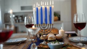 The Menorah (Hanukkah's Festival of Lights) and the Kinara (Kwanzaa's seven principles), along with the Umoja (unity) symbol. Perfect for holiday greetings, cultural celebrations, and respectful, - Powered by Shutterstock - Get 15% off with code: PIKWIZARD15