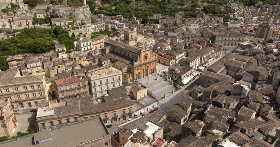 Aerial view of the facade and stairs of the Cathedral of San Pietro, located in Modica, in the province of Ragusa, Sicily, Italy. It is a symbolic monument of Sicilian Baroque and a town