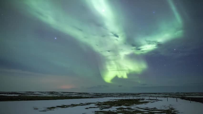 Breathtaking view of dancing Northern Lights in the night sky, capturing vibrant aurora colors, natural phenomena, and serene Arctic or sub-Arctic landscapes.