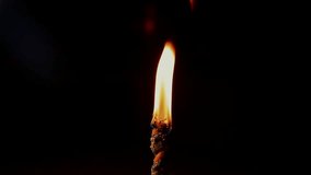 Closeup a bright fire light of power burning twisted ritual program magic candle flame in a dark. The sorcerer performs a magical rite with candles. Witchcraft and magic. mystical ritual with a spell. - Powered by Shutterstock - Get 15% off with code: PIKWIZARD15