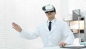 Modern technology. Doctor using virtual reality headset indoors - Powered by Shutterstock - Get 15% off with code: PIKWIZARD15