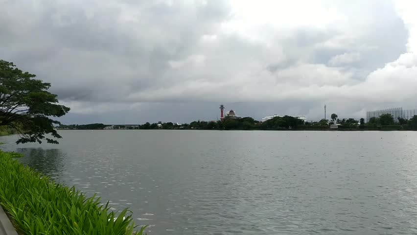 Scenic View of A Lake with Dramatic Heavy Clouds