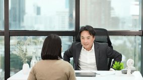 Businessman and colleague exchange handshake in bright office, natural light, positive professional interaction - Powered by Shutterstock - Get 15% off with code: PIKWIZARD15