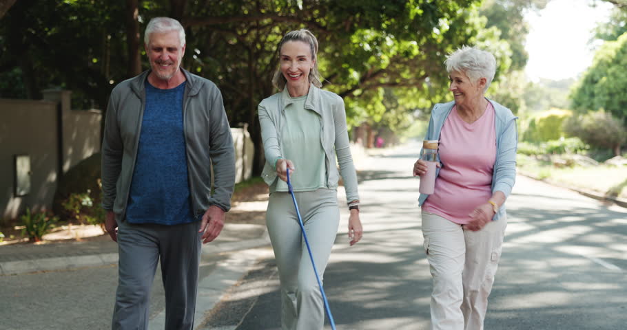 Outdoor, dog and old couple with daughter for morning walk, conversation and support for wellness. Animal care, fitness and happy people talking on road for exercise, retirement health or connection