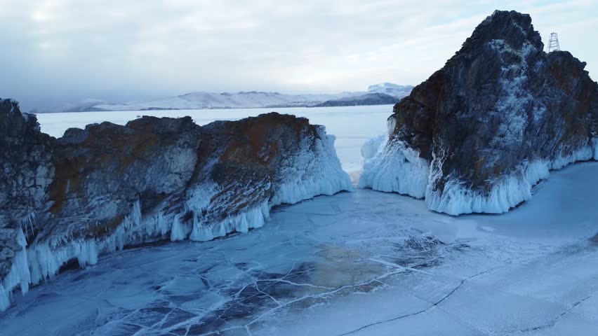 Aerial abstract giant epic ice surges at mountain foothills. Grandiose Arctic ice pillars, Northern nature, magnificent frozen landscape, majestic ice formations Baikal