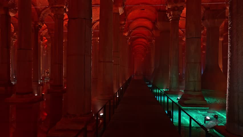 Historic Basilica Cistern in Istanbul with dramatic lighting, ancient columns and calm reflections creating a mystical underground atmosphere.