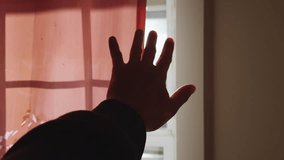 Hand Reaching Toward Light Through Window In Dim Room Scene. Sun Rays Illuminate A Man Hand As He Stretches Toward The Glow, Representing Inner Strength And Renewal. - Powered by Shutterstock - Get 15% off with code: PIKWIZARD15