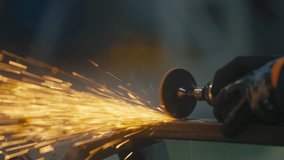 Close-Up of Worker Grinding Steel Pipe with Bright Sparks - Powered by Shutterstock - Get 15% off with code: PIKWIZARD15