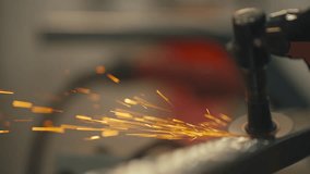 Close-Up of Worker Grinding Metal Tube with Sparks - Powered by Shutterstock - Get 15% off with code: PIKWIZARD15