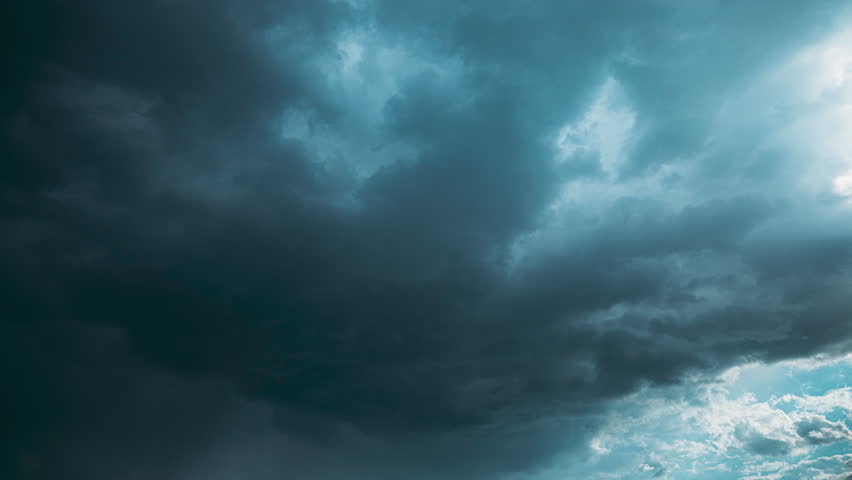 Cloudy Sky With Dark Storm Clouds During Rain. Natural Background With Rainclouds. 4K Time Lapse, Timelapse natural weather background dark blue backdrop thunderstorm stormy sky.