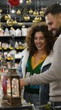 Happy couple shopping for Christmas decorations together - Powered by Shutterstock - Get 15% off with code: PIKWIZARD15