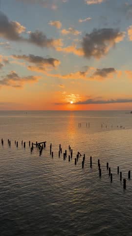 Biloxi, Mississippi golden sunset over the Gulf of Mexico 
