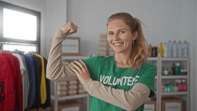 Woman arm flexing charity blonde young volunteer donation smile confident conveys empowerment spirit. - Powered by Shutterstock - Get 15% off with code: PIKWIZARD15