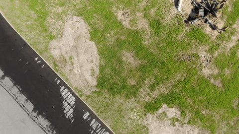 Drone Revealing Wartime Village Reconstruction near Cathedral