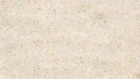 Water droplet impacts sandy surface, forming symmetrical ripple waves. Sunlight enhances translucent rings in fluid motion. Minimalist scene of natural rhythm and energy. - Powered by Shutterstock - Get 15% off with code: PIKWIZARD15