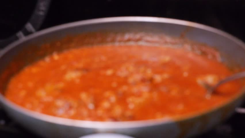 pasta sauce cooking in pan , bolognaise