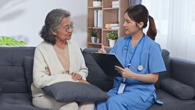 Asian elderly care nurse patient living room home visit medical consultation stethoscope clipboard conversation caregiver healthcare senior woman adult caregiver domestic interior consultation health - Powered by Shutterstock - Get 15% off with code: PIKWIZARD15