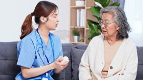 Asian nurse caregiver home consultation with elderly patient discussing medication and care plan using stethoscope and clipboard compassionate support during at home medication explanation - Powered by Shutterstock - Get 15% off with code: PIKWIZARD15
