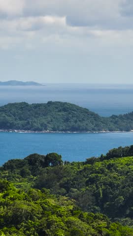 Tropical beaches in Islands surrounded by blue sea in the Philippines. Vertical view.