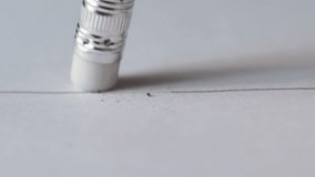 Macro Eraser Rubbing Out Pencil Line on Paper, Eraser on Back of Drafting Pencil Concept - Powered by Shutterstock - Get 15% off with code: PIKWIZARD15