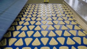Cheese crackers production line in a food factory - Powered by Shutterstock - Get 15% off with code: PIKWIZARD15
