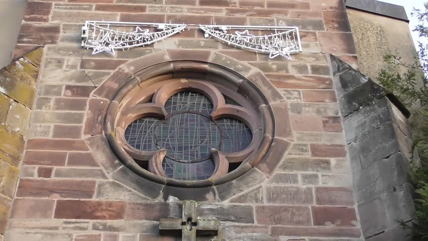 Christmas light on the church of Schoeneck in France during sunset time