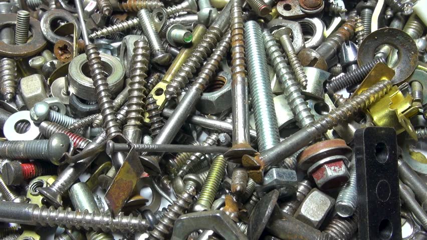 Metal nails, screws, bolts in a pile