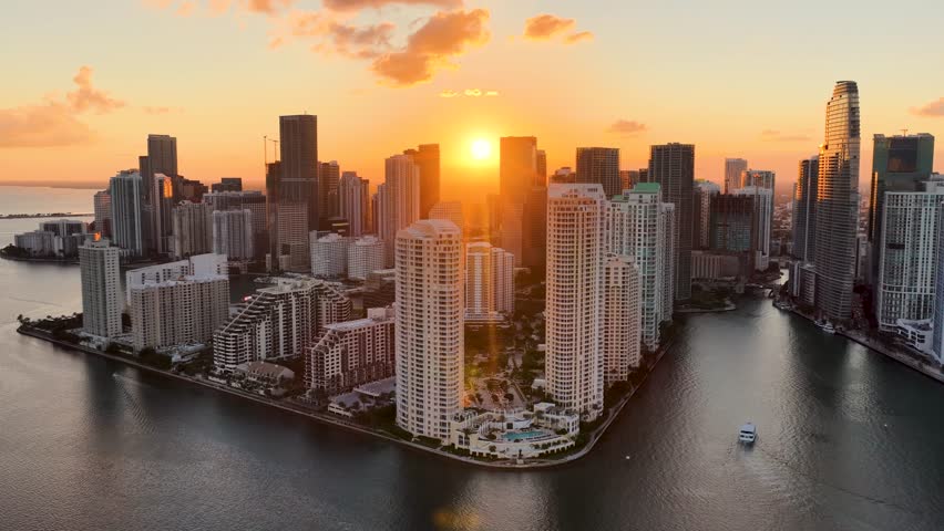 Sunset Skyline At Miami Beach In Florida United States. Sunset City. Stunning Biscayne Bay. Downtown District. Sunset Skyline At Miami Beach In Florida United States. Highrise Buildings.