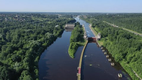 Drone Moving along Canal Revealing Lock Surrounding