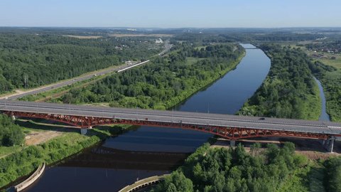 Drone Descending Sideways along Highway Bridge
