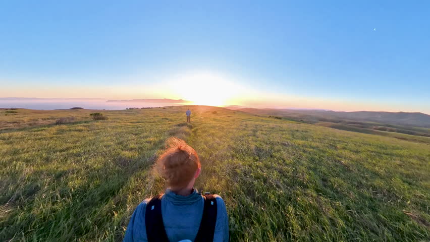 Overhead of Couple Hiking Into the Sun in Channel Islands National Park