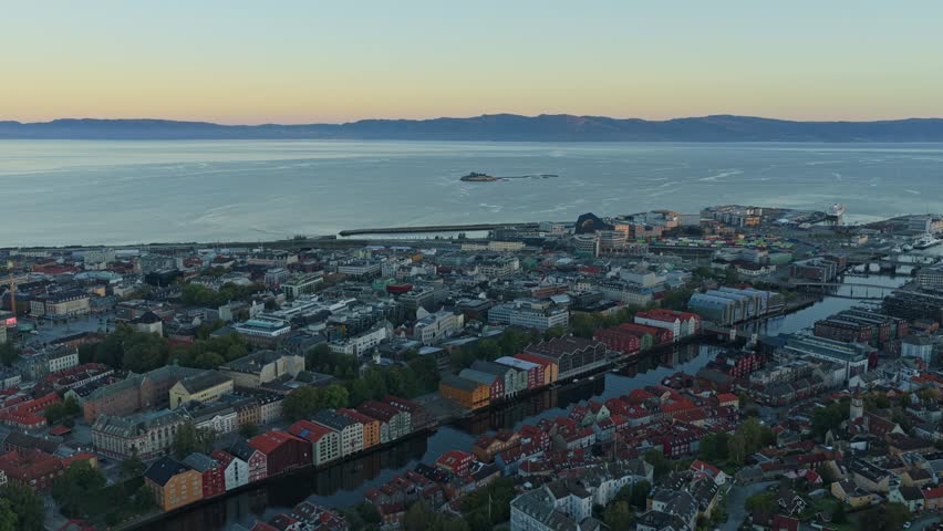 Trondheim city aerial with colorful riverfront warehouses in Norway