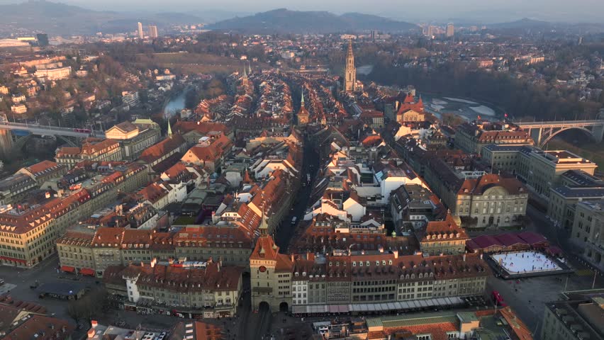Bern Old Town, The Capital of Switzerland from above in Evening Sunset Light at Winter. Aerial Drone shot.