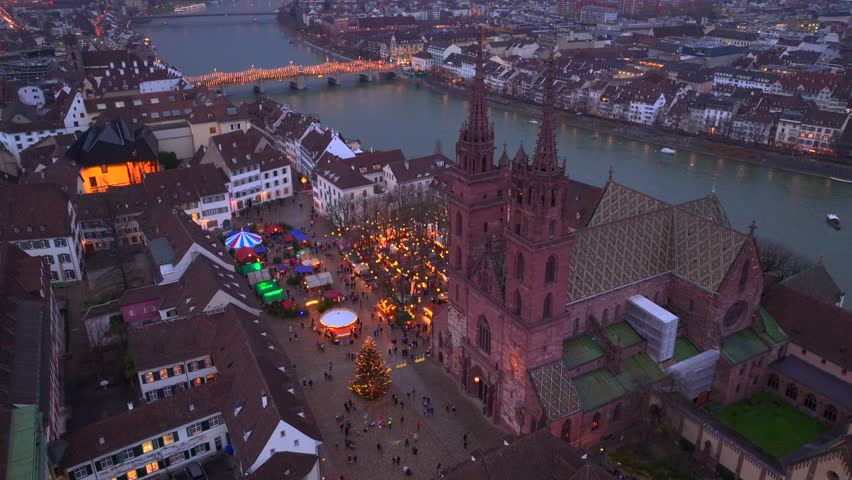 Basel Christmas Market Aerial Shot. Illuminated Basler Weihnachtsmarkt in the evening Twilights at Winter in Switzerland