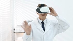 Modern technology. Doctor using virtual reality headset indoors - Powered by Shutterstock - Get 15% off with code: PIKWIZARD15
