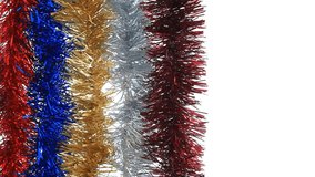Colorful Christmas tinsel in red, blue, gold, and silver shimmering against a clean white background. Festive holiday garlands gently moving, creating a bright and decorative seasonal atmosphere. Perf - Powered by Shutterstock - Get 15% off with code: PIKWIZARD15