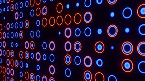 A seamless looping animation featuring glowing blue and orange neon rings arranged in a dynamic grid with smooth depth and light transitions - Powered by Shutterstock - Get 15% off with code: PIKWIZARD15