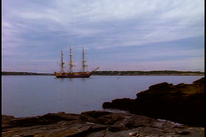 Historical reenactment of HMS Bounty ship on Rhode Island. LS Bounty with furled sails into harbor. 