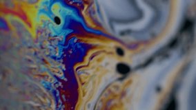 Vertical video. Defocused paint blend. Soap colorful chaos. Vibrant wave curl liquid. Fantasy gradient contrast mix gasoline floating abstract background. - Powered by Shutterstock - Get 15% off with code: PIKWIZARD15