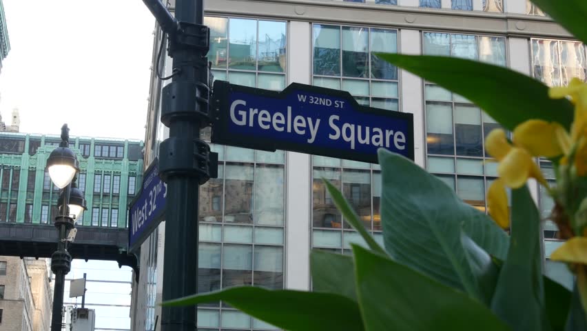 New York City Gimbels bridge, Manhattan Midtown, United States of America. Skybridge on Broadway, Herald Square, USA. Gimbels traverse on 6 avenue. Historic elevated walkway 1925. Greeley Square sign.