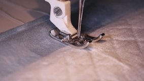 Close-up stitching process on sewing machine showing precision and technique in fabric crafting - Powered by Shutterstock - Get 15% off with code: PIKWIZARD15