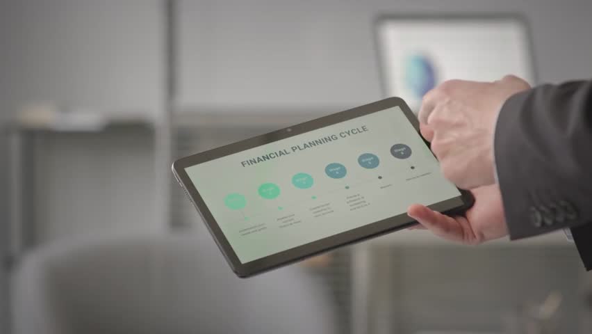 Senior managers collaborate over a digital tablet, analyzing financial data and refining strategy for business growth.
 - Powered by Shutterstock - Get 15% off with code: PIKWIZARD15